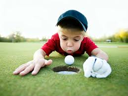 kid cheating golf